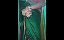 Gauri Sissy: Indian Gay Crossdresser Gaurisissy în sari verde apăsându-și sânii mari și futându-se...