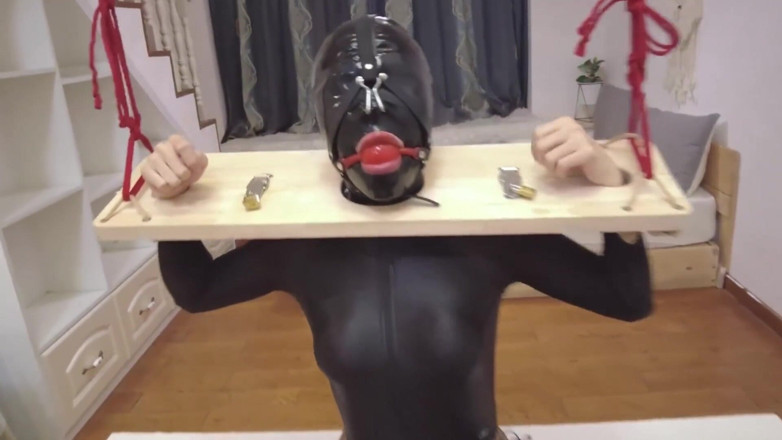 Aisan girl bondage: Mz22 - the Latex Girl in Shackles and Restraint
