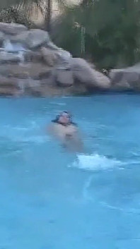 Hot Young Shemale Gets a Naked Swim in the Pool