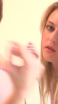 Brunette and Blonde Teen Touching Each Other Boobs in a Sensual Way