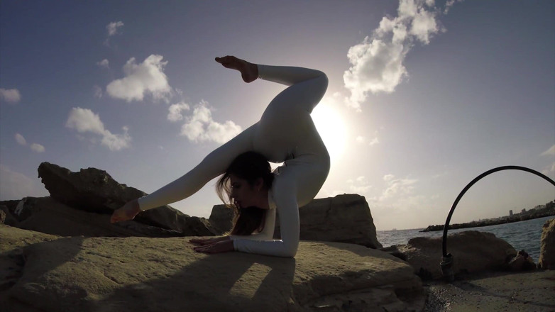 Flexilady: Elegnant Contortionist in White Spandex