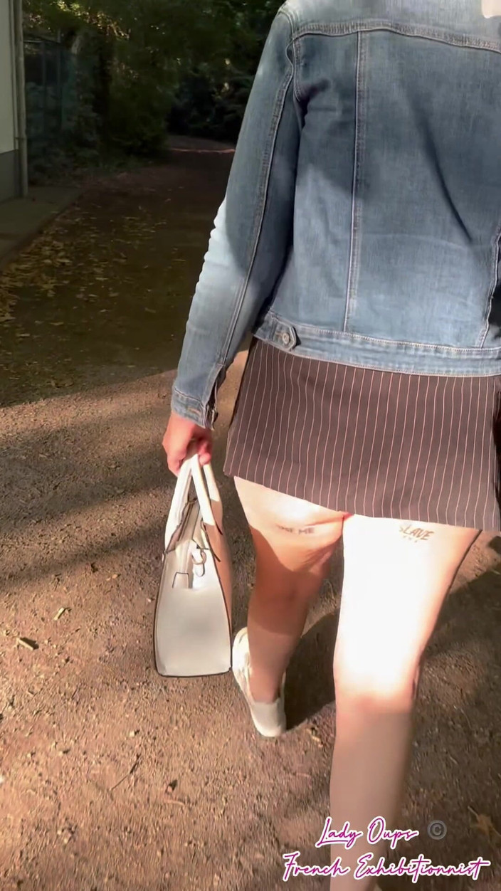 Lady Oups: Public Flashing with Micro Skirt Anal Plug and Slave Collar