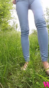 Full Bladder Skinny Brunette Pissing in the Woods in the Tall Grass