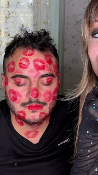Red Lipstick Kisses Cover His Entire Face