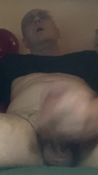 Masturbating