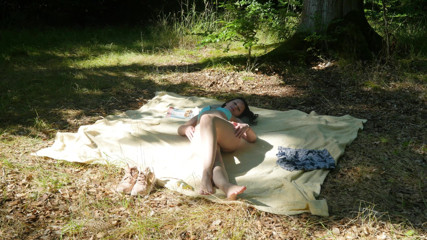 Peaches and Bananas: Naked Charlie sunbathing on a nude beach