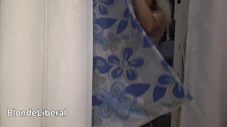 BlondeLiberal: Naughty Housewife Showing off to Passers-by While Her Husband Works