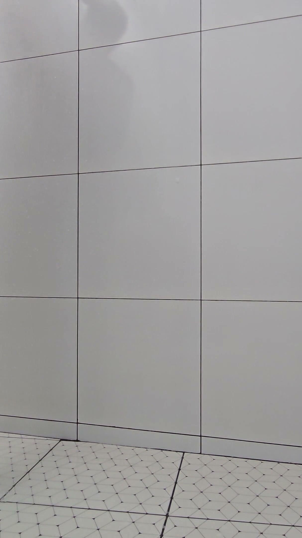 Sissy Kanisa Is Taking Shower in White Shower Room