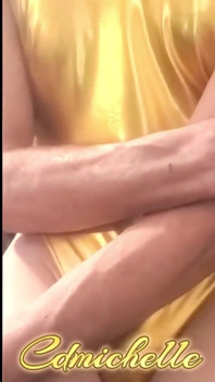 Cdmichelle Wearing Gold Bodysuit