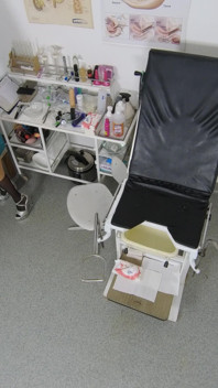 Recording of rectal temperature measurement of naked female