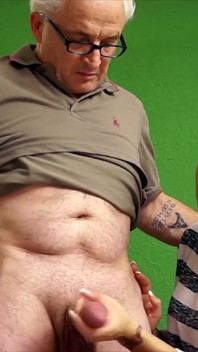 Holly gives his stepdad a hot handjob