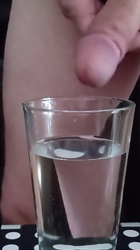 Cumming in a glass of hot water 