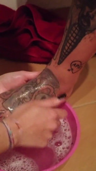 Foot washing for tattooed women 1