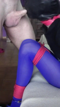 Bound in blue pantyhose and high heels, ballgagged had to suck a big cock until he comes in her mouth