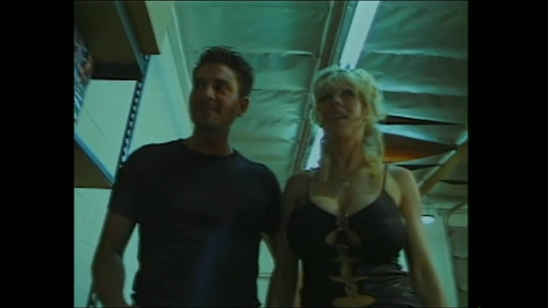 MCG Empire: Busty Girl Made up in a Pornographic Warehouse
