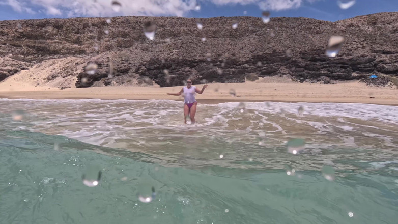Emma Voyeur: Girl Wetting Jeans in the Ocean and Swimming in Wet...