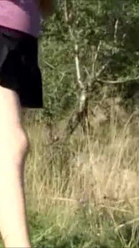 Horny brunette with big boobs masturbating outdoor