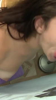 Milano Mor does blowjob and deepthroat as cock comes out from the hole