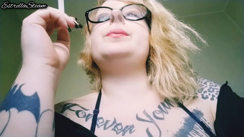 Estrella Steam: Blonde smokes a cigarette NO AUDIO