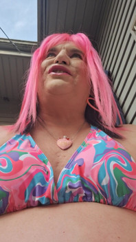 Sitting Outside Sunbathing and Teasing Men!