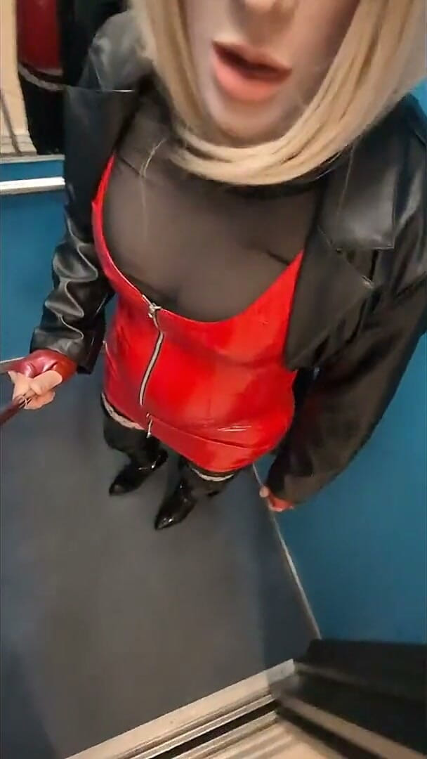 Public Walk in Parking House, Blonde in Overknee Boots, Red Pvc Dress and Long Leather Coat. (Chatuser)