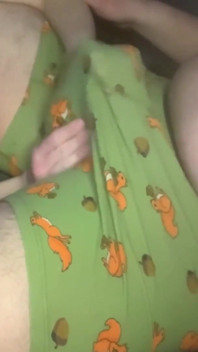 She sucks him and masturbates him by surprise in front of the TV