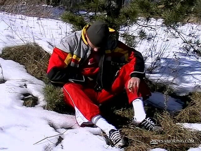 Boys Smoking: Roma smokes in the snow