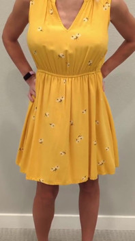 Stella in a Yellow Sun Dress with Black Heels