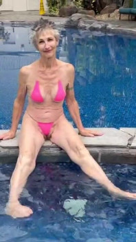 By the Hotel Pool in My Skimpy Pink Bikini