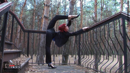 Gymrotic: Busty contortionist in blue catsuit