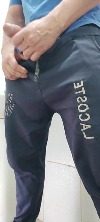 A Well-endowed Brazilian Man Urinating and Showing His Thick Penis to His Female Friends.