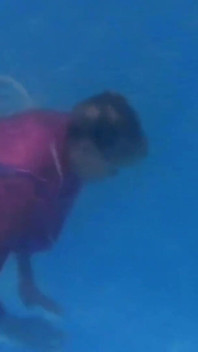 Swim & Play in Pvc Mac, Latex and Heels