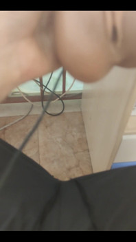 Masturbating
