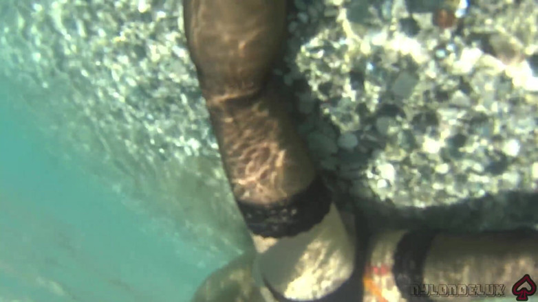 Nylondelux: Black Stocking and Anal Beads in the Sea