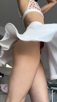 Slow Motion Skirt Twists Red Panties Sheer Bra
