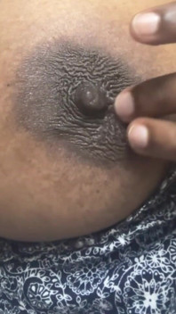 Playing with Her Nipple