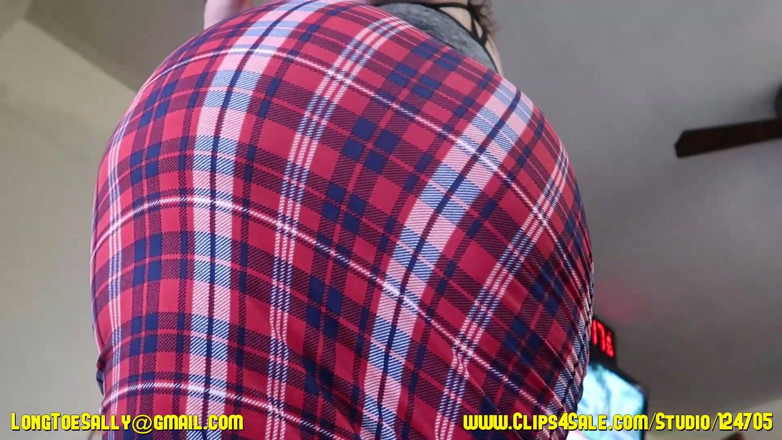 Long Toe Sally Big Buns: Wearing a plaid skirt