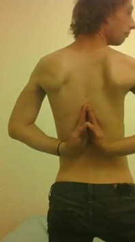 Topless Transgirl Surprised at Her Own Flexibility