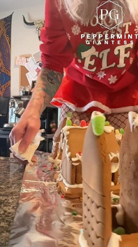 73 Giantess in 8-inch Heels Decorates a Gingerbread Village