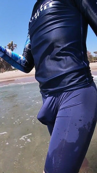 Surfer Gets Erect in His Lycra for the Pleasure of the People