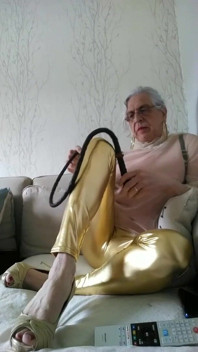 Whore in Leggings with a Whip