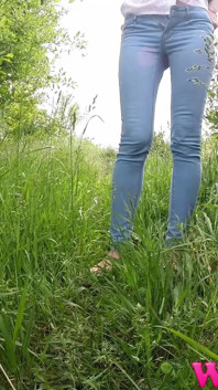 Skinny Brunette with Full Bladder Has to Pee in the Forest and Wet the Tall Grass Touching Her Wet Pussy
