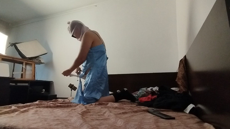 Amateur_MS: Amateur Woman Has Fun Trying on Clothes and Cutting Them.