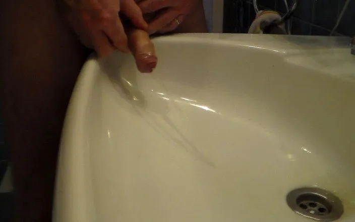 Sex hub male: John is peeing into the bathroom sink