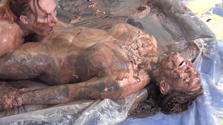 Gunked up girls: Chloe dominates Tallulah in cake