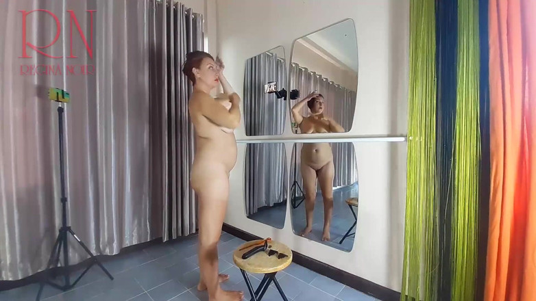 Regina Noir: Naked nudist hairdresser. She cuts her own hair. Regina Noir...