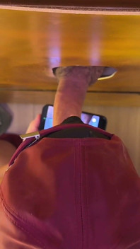 His Drop of Pleasure Drips From the Foreskin at the Gloryhole