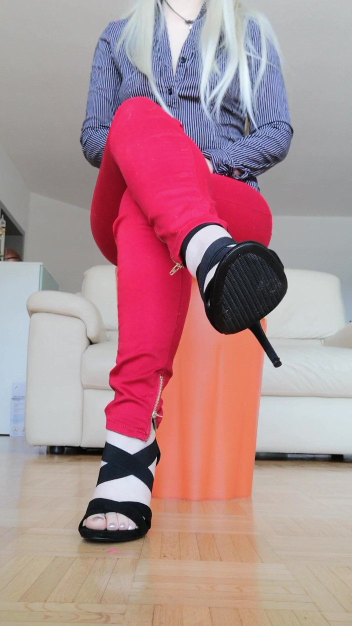 RavenBigAss: Raven Toe-tapping with Crossed Legs Red Jeans and High-heeled Sandals