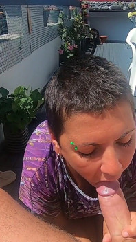Blowjob on our terrace with some handfree sucking