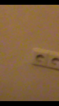 Robe-wearing Dominatrix